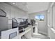 Modern home office setup with built-in storage and a view of the sky at 2010 20Th Avenue Pkwy, Indian Rocks Beach, FL 33785