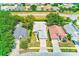 An aerial view of a charming home with well-maintained landscaping and a long driveway at 22943 Sills Loop, Land O Lakes, FL 34639