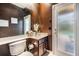 Compact bathroom with modern fixtures, vanity, and neutral tones at 2354 Messenger Cir, Safety Harbor, FL 34695