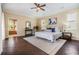 Spacious main bedroom with hardwood floors and abundant natural light at 2354 Messenger Cir, Safety Harbor, FL 34695