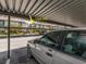 Another view of assigned covered parking spot for unit 210 residents and guests at 2597 Countryside Blvd # 210, Clearwater, FL 33761