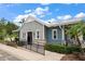 Charming building featuring a ramp for accessibility and blue toned sidings at 2816 Grand Kemerton Pl, Tampa, FL 33618