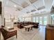 Open concept living space features a living room with kitchen and dining area at 2890 Alexandria Marie Ln, Lutz, FL 33559