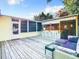 Backyard patio featuring a wet bar, outdoor seating, and plenty of room to spread out at 2928 W Arch St, Tampa, FL 33607