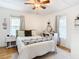 Cozy bedroom featuring natural light and a comfortable bed with stylish decor at 2928 W Arch St, Tampa, FL 33607