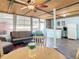 Bright living room with a dining area, bar, and comfortable wicker furniture set at 2928 W Arch St, Tampa, FL 33607