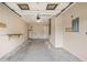 Attached garage featuring water heater and utility sink at 2986 Cypress Green Dr, Palm Harbor, FL 34684