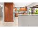 Modern kitchen featuring stainless steel appliances, ample cabinets, and tile flooring at 2986 Cypress Green Dr, Palm Harbor, FL 34684