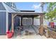 Backyard gazebo offering an outdoor space for relaxation and entertaining, set in a spacious yard at 301 14Th Ave, Indian Rocks Beach, FL 33785