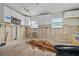 Kitchen with cabinets, sink, and a large window, plus exposed walls at 301 14Th Ave, Indian Rocks Beach, FL 33785