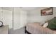 Comfortable bedroom featuring neutral tones, soft textures, and ample natural light at 3050 Pink Gerbera Sq, Plant City, FL 33566