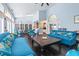Bright and spacious resident lounge with comfortable seating, a fireplace, and stylish decor for relaxation at 3301 Haviland Ct # 203, Palm Harbor, FL 34684
