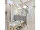 Modern bathroom featuring double vanity, glass-enclosed shower, and contemporary fixtures at 33287 Sycamore Leaf Dr, Wesley Chapel, FL 33545
