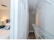 Walk-in closet with built-in shelving for organized storage, located off the bedroom at 415 Mission Hills Ave, Temple Terrace, FL 33617