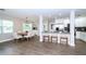 Modern kitchen with white cabinets, stainless steel appliances, and an open layout for easy entertaining at 415 Mission Hills Ave, Temple Terrace, FL 33617