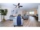 Comfortable living room offers plenty of space for entertaining, ceiling fan, and modern decor at 415 Mission Hills Ave, Temple Terrace, FL 33617