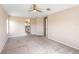 Spacious bedroom featuring plush carpet and a doorway that leads into an adjoining bathroom at 419 Stone Briar Dr, Ruskin, FL 33570