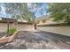 Home exterior featuring a driveway, front yard, and attached two-car garage, beautiful residence at 4463 Vieux Carre Cir, Tampa, FL 33613