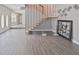 Spacious living room with tiled floors, staircase, and contemporary design that offers a comfortable atmosphere at 4463 Vieux Carre Cir, Tampa, FL 33613
