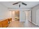 Main bedroom with a ceiling fan, tiled floors and includes closet space, ideal for comfortable living at 4463 Vieux Carre Cir, Tampa, FL 33613