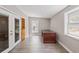 Office featuring tile flooring, a built in bookcase and a dark desk at 4463 Vieux Carre Cir, Tampa, FL 33613