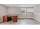 Office featuring tile flooring and a dark desk with multiple drawers at 4463 Vieux Carre Cir, Tampa, FL 33613