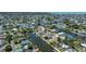 Scenic aerial view of a waterfront neighborhood with canals and residential properties at 4464 Neptune Dr, Hernando Beach, FL 34607