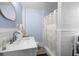 The stylish bathroom is equipped with a shower and a modern vanity sink at 4464 Neptune Dr, Hernando Beach, FL 34607