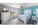 Bright bedroom with large windows, modern furniture, and soothing decor for a relaxing retreat at 4464 Neptune Dr, Hernando Beach, FL 34607
