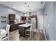 Modern kitchen featuring a center island, stainless steel appliances, and elegant pendant lighting at 4464 Neptune Dr, Hernando Beach, FL 34607