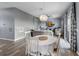 Open-concept living room featuring modern furnishings, decor, and a dining area, creating a welcoming atmosphere at 4464 Neptune Dr, Hernando Beach, FL 34607