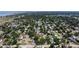 Aerial view of a residential neighborhood with lush greenery, showcasing the homes and the surrounding natural beauty of the area at 4609 S Shamrock Rd, Tampa, FL 33611