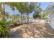 Fully fenced backyard featuring lush tropical landscaping creating a private outdoor retreat at 4609 S Shamrock Rd, Tampa, FL 33611
