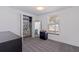 Bedroom featuring carpet flooring, closet with storage and shelving, window, mirror and dark furnishings at 4609 S Shamrock Rd, Tampa, FL 33611