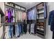 A well-organized walk-in closet with clothing racks, shelves, and ample storage space at 4609 S Shamrock Rd, Tampa, FL 33611