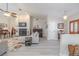 Inviting living room showcasing a fireplace, neutral decor, and new flooring at 465 Holly Hill Rd, Oldsmar, FL 34677