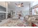 Bright living room with fireplace, open floorplan, and ample space for entertaining guests and relaxing at 465 Holly Hill Rd, Oldsmar, FL 34677