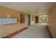 Exterior entryway showcasing mailboxes, a security door, and concrete flooring at 4708 Michael Ct # 103, Tampa, FL 33614