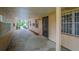 Exterior shot of multiple units, each featuring a secure black metal door and barred windows for added privacy at 4708 Michael Ct # 103, Tampa, FL 33614