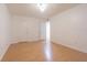 Bedroom featuring neutral walls, wooden floors, and a large door to the outside at 4708 Michael Ct # 104, Tampa, FL 33614