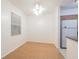 Bright dining area features wood flooring, a ceiling fan, and natural light from the window at 4708 Michael Ct # 104, Tampa, FL 33614