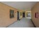 A cozy outdoor covered entryway featuring secure doors and access to convenient amenities at 4708 Michael Ct # 104, Tampa, FL 33614