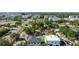 Aerial view of the property with nearby street and surrounding neighborhood; prime location at 4735 W Leila Ave, Tampa, FL 33616