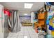 Functional bedroom features tile flooring, ample storage, and a cozy sleeping area at 4735 W Leila Ave, Tampa, FL 33616