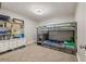 Nice bedroom with bunk beds, carpet and good natural light from the window at 4735 W Leila Ave, Tampa, FL 33616