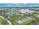 Aerial view of the community amenities including pool, bocce ball court, and clubhouse at 4795 Freccia Loop, Wesley Chapel, FL 33543