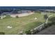 Aerial view of the community golf course, featuring sand traps, ponds and lush fairways at 4795 Freccia Loop, Wesley Chapel, FL 33543