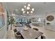 Spacious open-concept layout combines the dining, living, and kitchen areas for modern living at 4795 Freccia Loop, Wesley Chapel, FL 33543