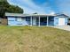 Charming home featuring a covered entry and a well-maintained front yard at 4836 Daphne St, New Port Richey, FL 34652