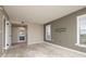 Bedroom with an en-suite bath and plenty of natural light from a window with blinds at 4900 Brittany S Dr # 613, St Petersburg, FL 33715